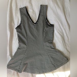 Black and white polka dot peplum top